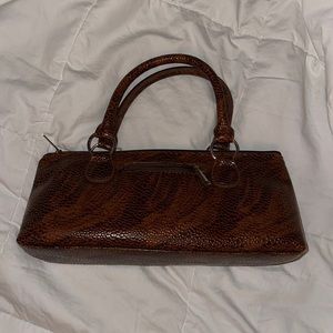 Brown insulated wine clutch with tags